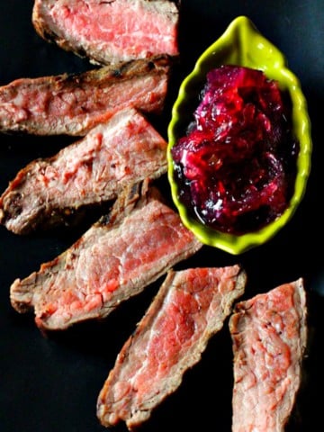 Sliced pan seared flank steak served with red onion marmalade.