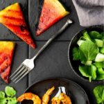 grilled watermelon with curried shrimp and mache and cucumber salad