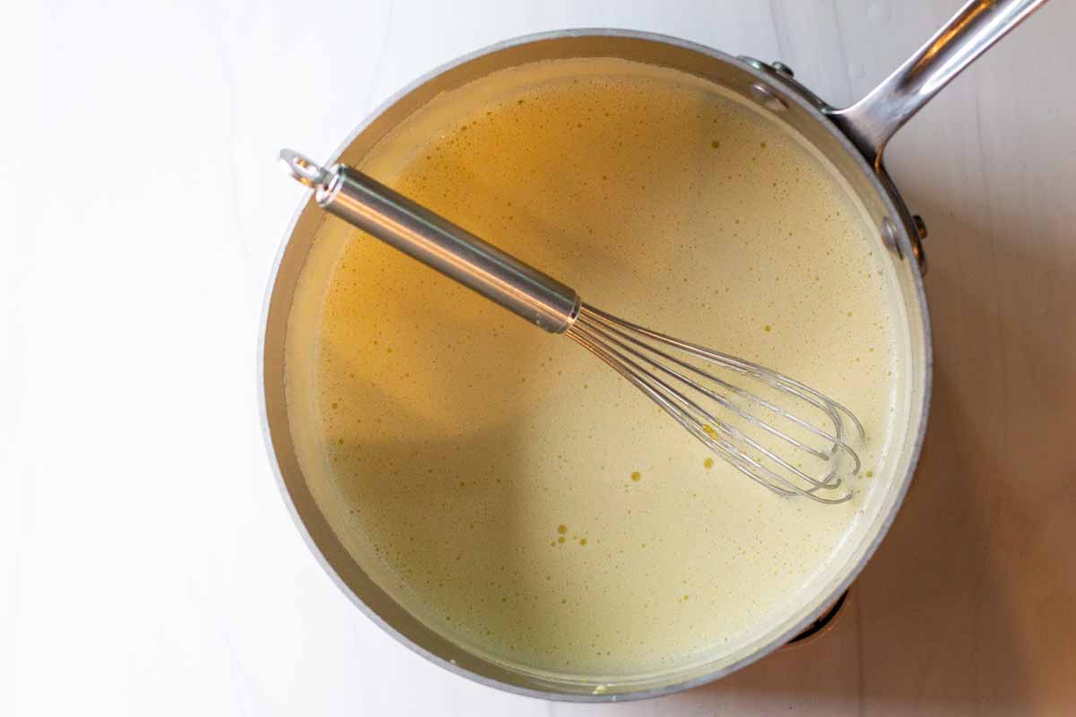 Making a custard in a saucepan to make homemade ice cream.