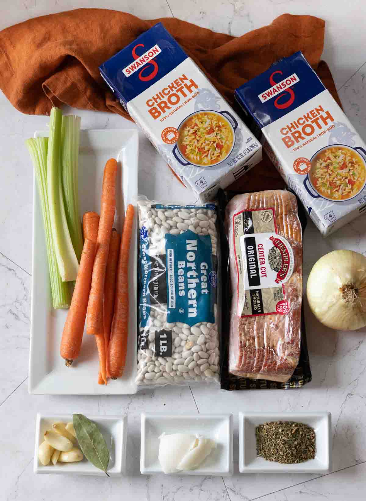 Ingredients to make Great Northern Bean Soup with Bacon.