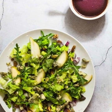 Cranberry Vinaigrette with pear, walnut, blue cheese salad.