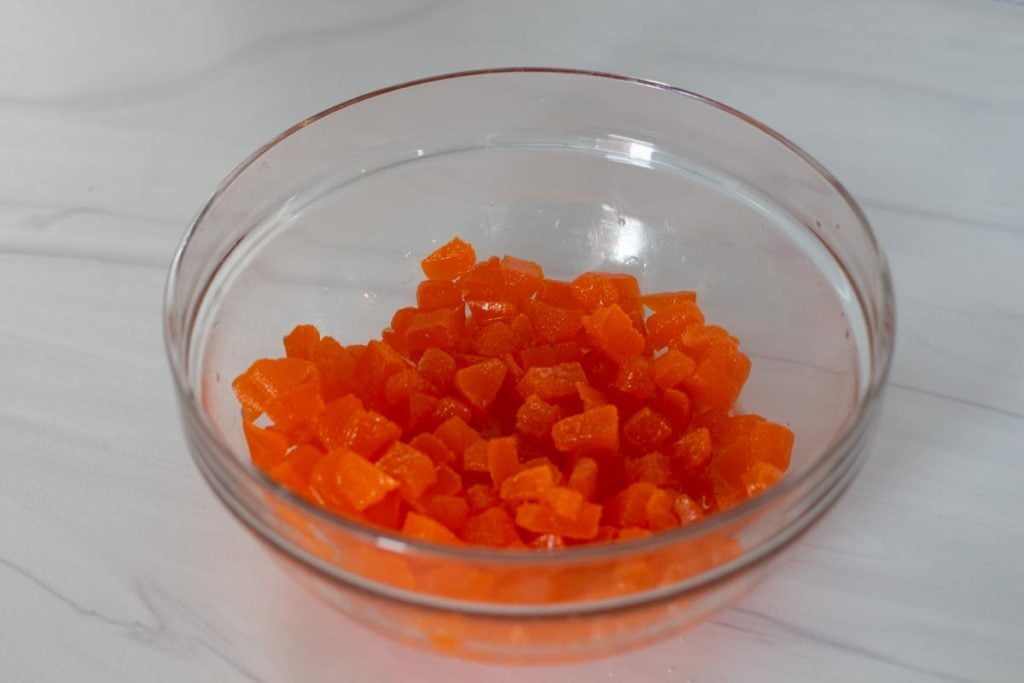 soaking orange slice candy pieces in water