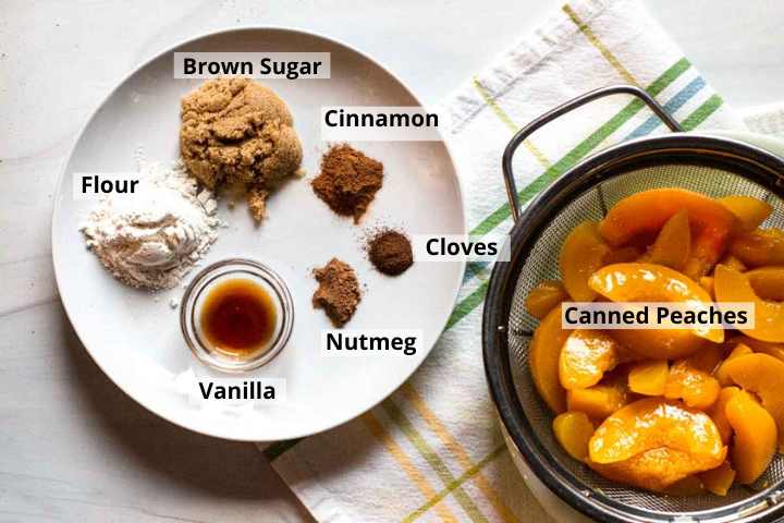 Ingredients to make peach pie with canned peaches.