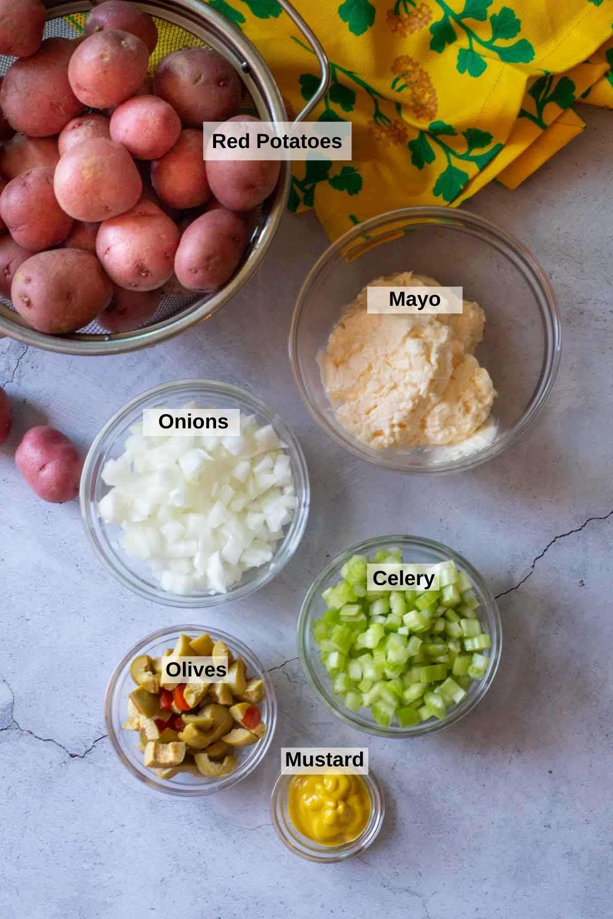 Ingredients to make classic potato salad with mayo and mustard.