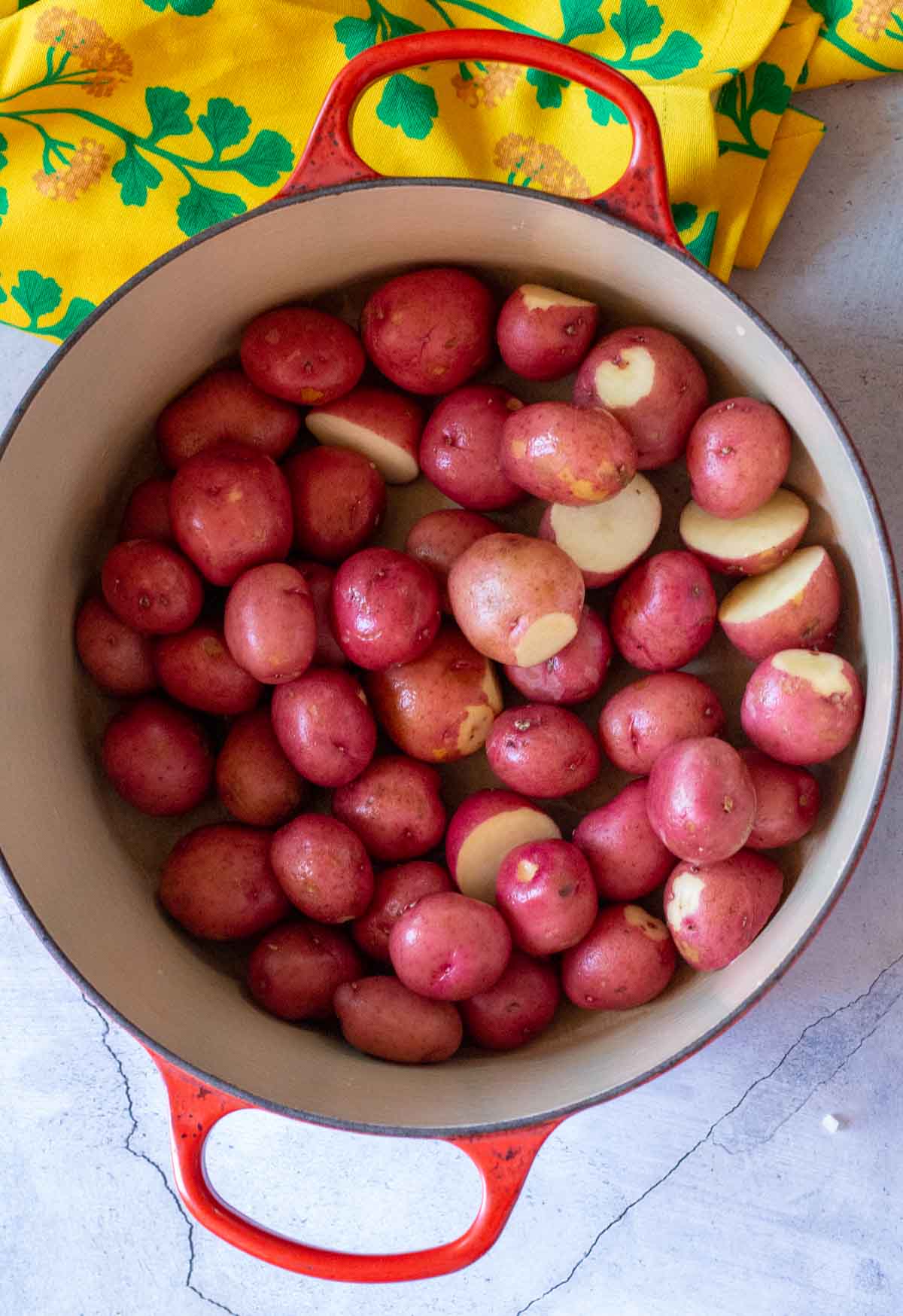 Red Potatoes to make old fashioned potato salad in a dutch oven.