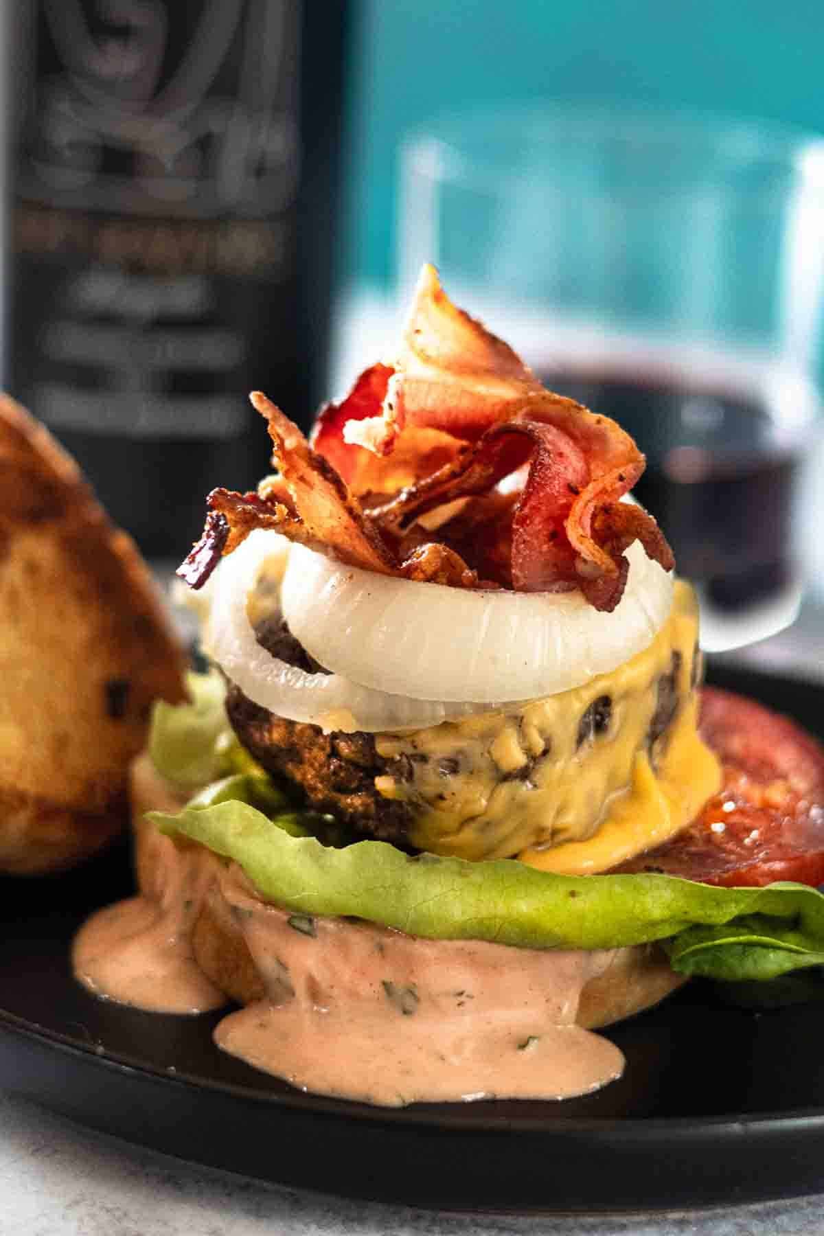A BLT burger with tarragon dressing.