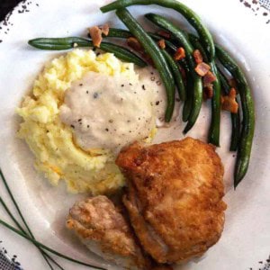 Pan fried chicken with homemade fried chicken gravy.