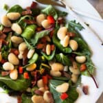 Warm Butter Bean Salad served on a white platter plate.