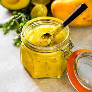 A jar of homemade mango dressing with habanero.