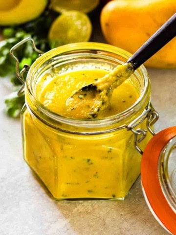 A jar of homemade mango dressing with habanero.
