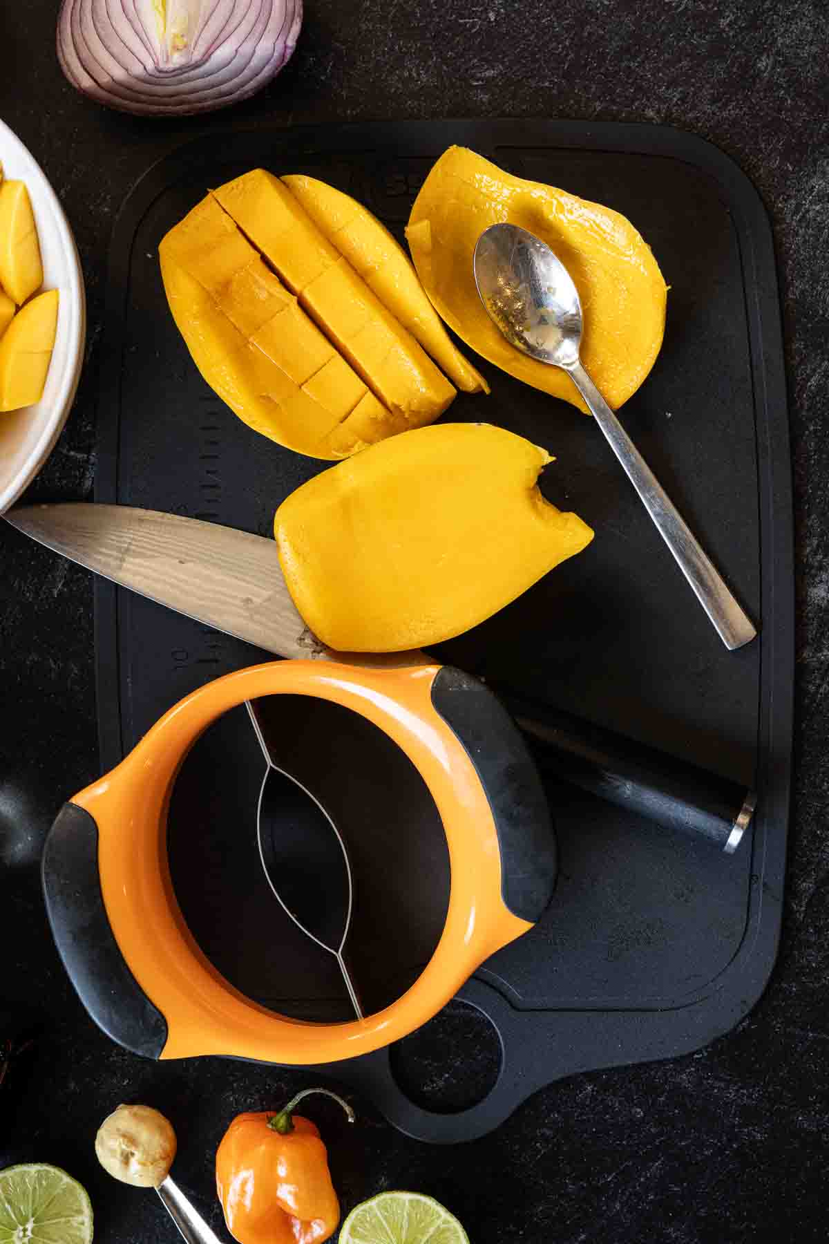 Step 1, how to cut a mango to make mango dressing.