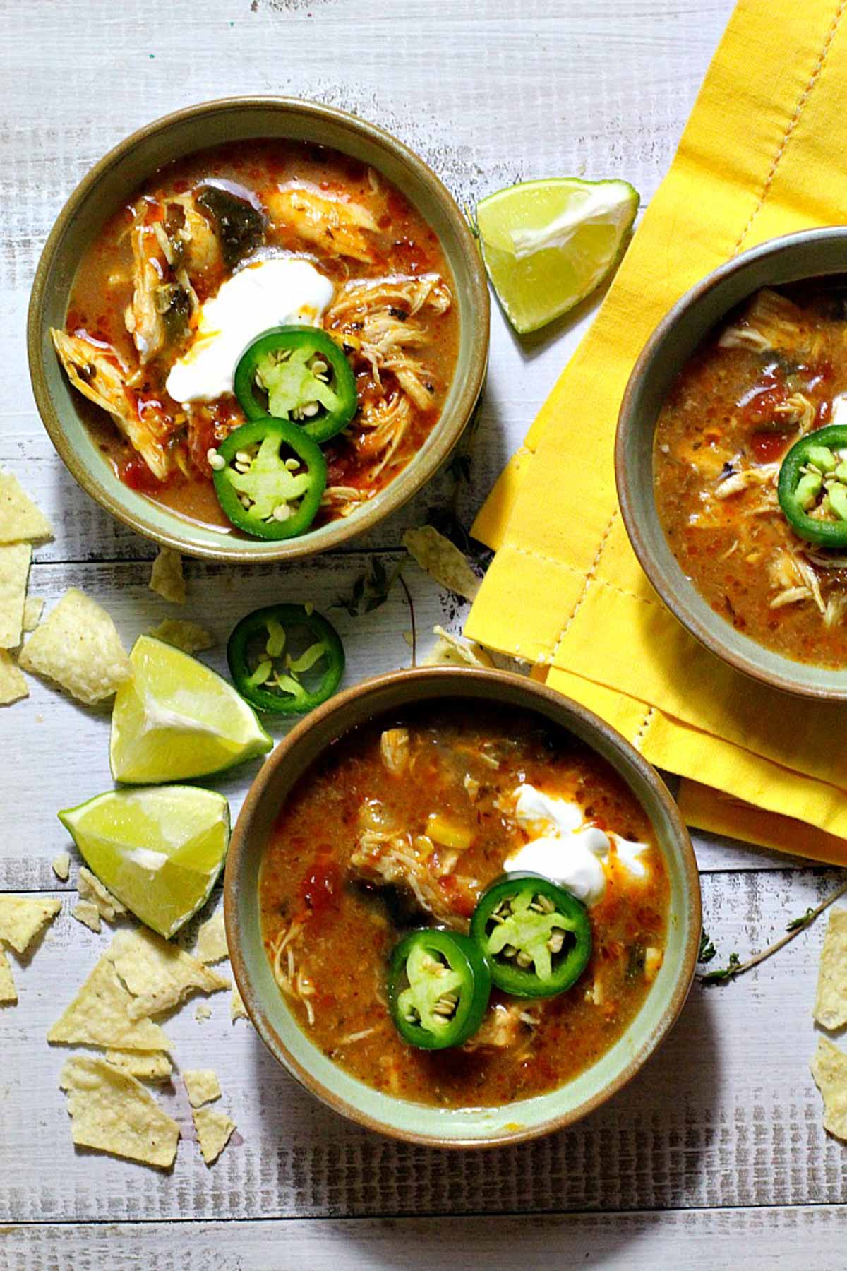 Mexican Chicken Tortilla Soup topped with sour cream and sliced jalapenos