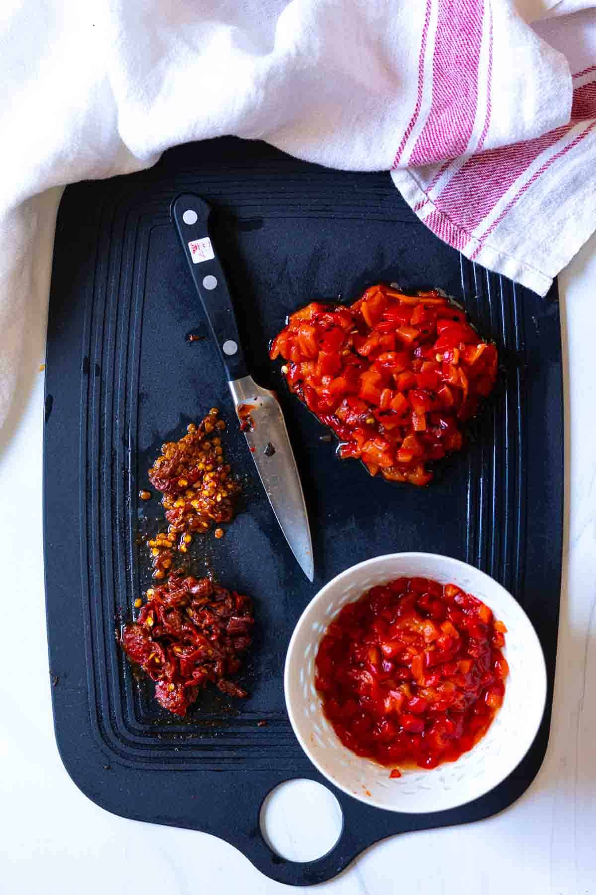 Chopped peppers to make spicy pimento cheese spread.