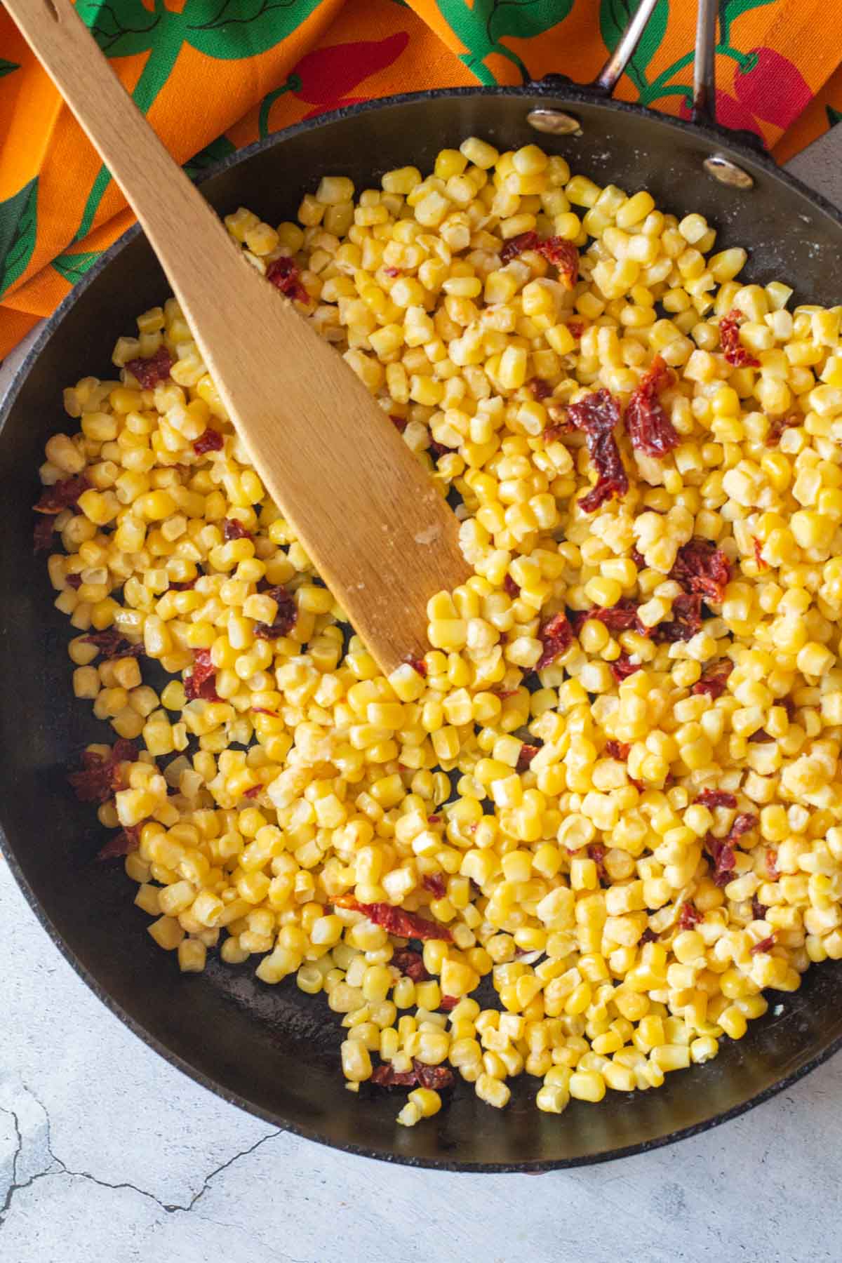 Frying corn for skillet corn with sun-dried tomatoes.