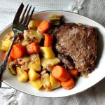 Old Fashioned Sunday Pot Roast Dinner Recipe. With potatoes, carrots, celery and onion, this is the original one pot meal.