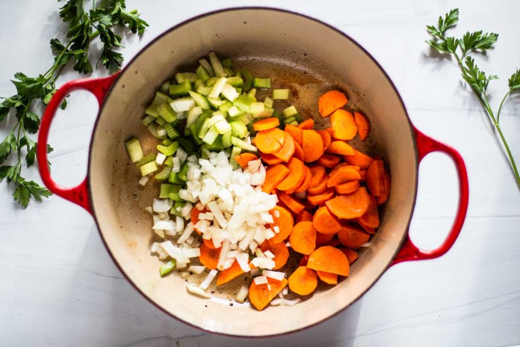 Chopped vegetables to make chicken noodle soup