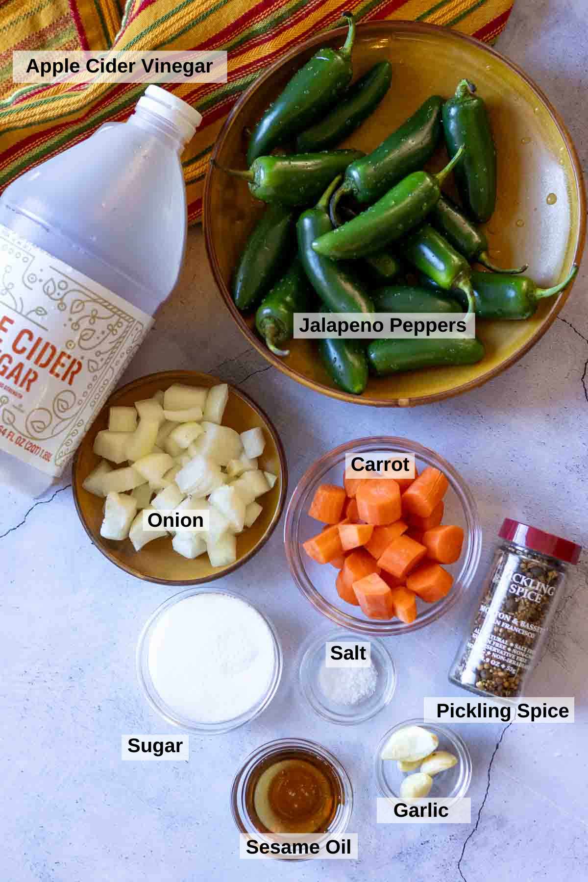 Ingredients to make pickles jalapeno peppers.