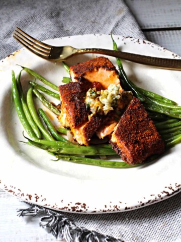 salmon rubbed with spices served over green beans