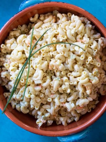 Amish Macaroni Salad served in a rustic bowl.