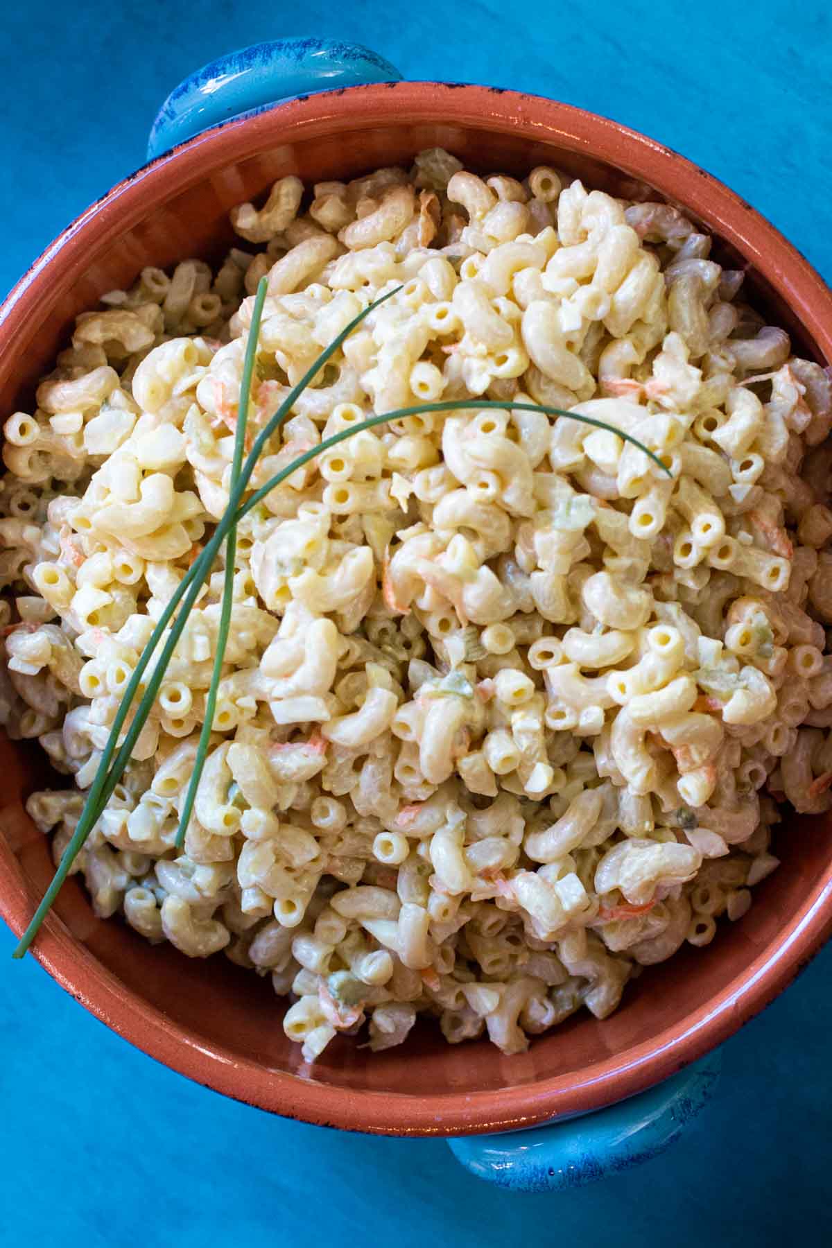 Amish Macaroni Salad served in a rustic bowl.