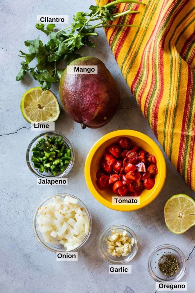 Ingredients to make mango pico de gallo.