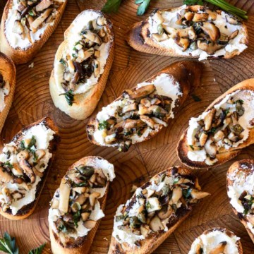 Slices of Mushroom bruschetta with goat cheese.
