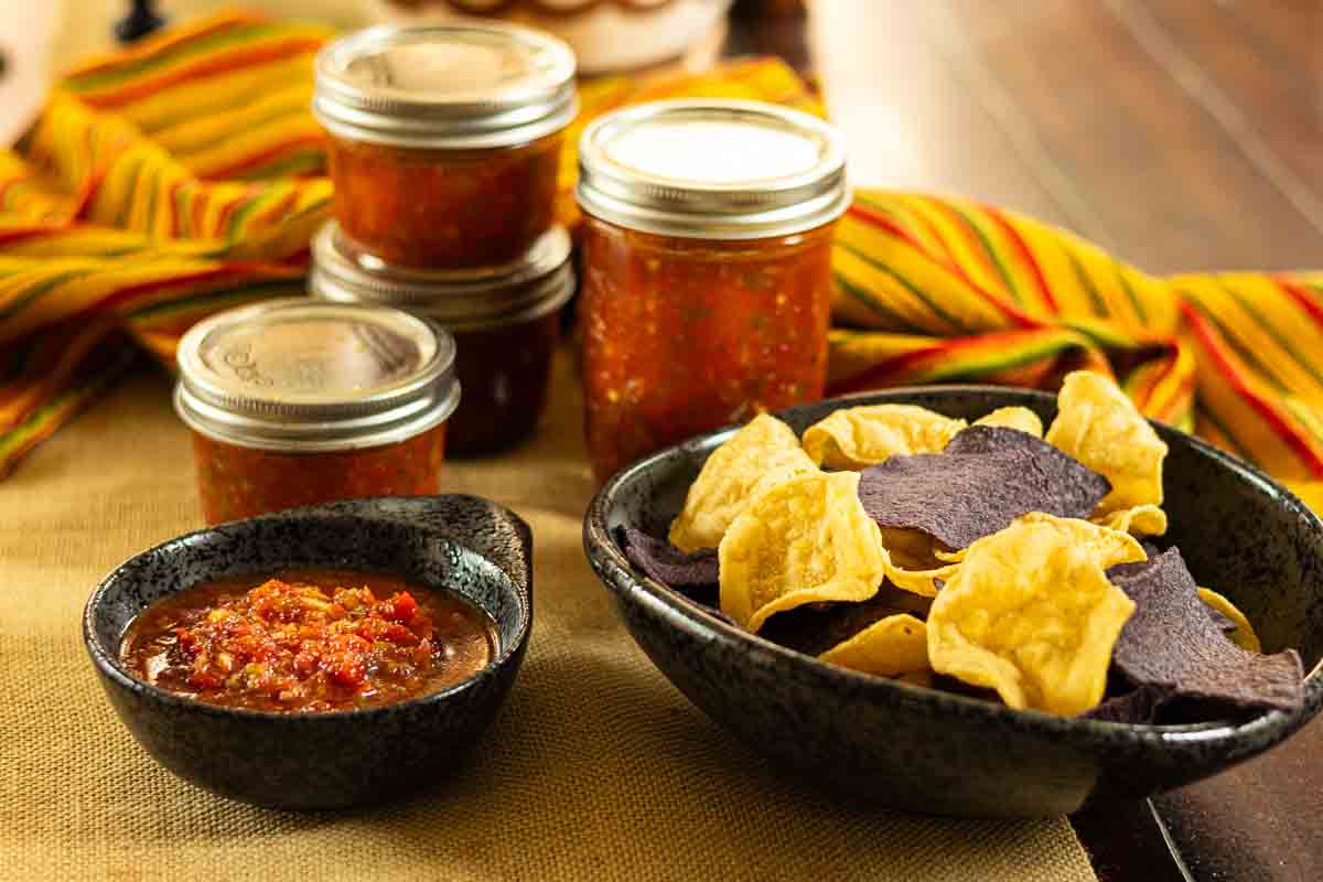 Freezer salsa served with a mix of blue and yellow corn tortillas.