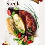 grilled ham steak with baked potatoes and salad