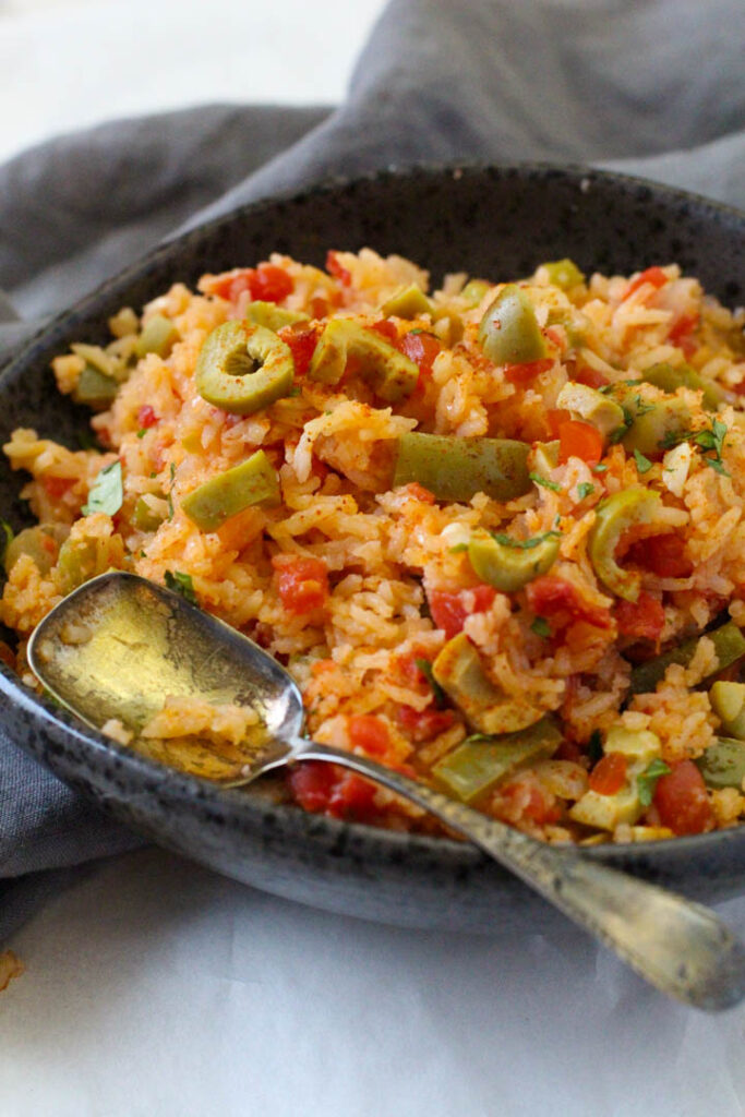 Mexican Green Rice with bell peppers, green olives and tomatoes