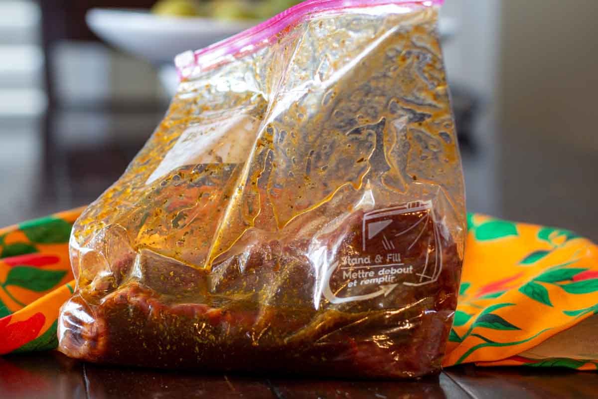 How to marinate flank steak in a plastic bag to make carne asada.