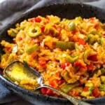 Mexican Green Rice served in a black serving bowl.