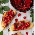 Best tomato and basil bruschetta recipe on sliced toasted baguettes