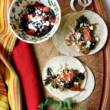 Swiss Chard tacos with caramelized onions.