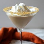 Pumpkin Martini recipe topped with whipped cream.