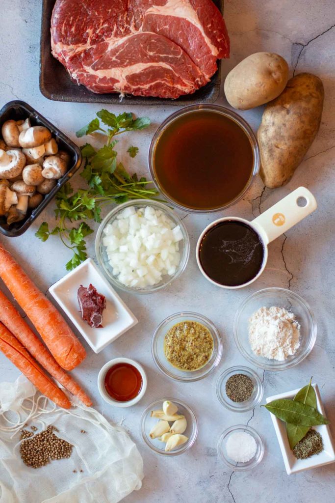 Ingredients to make crock-pot beef stew with mushrooms