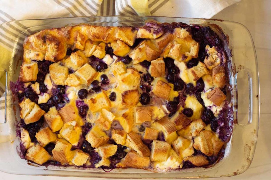 Baked blueberry french toast casserole in a 9 x 13 casserole pan.