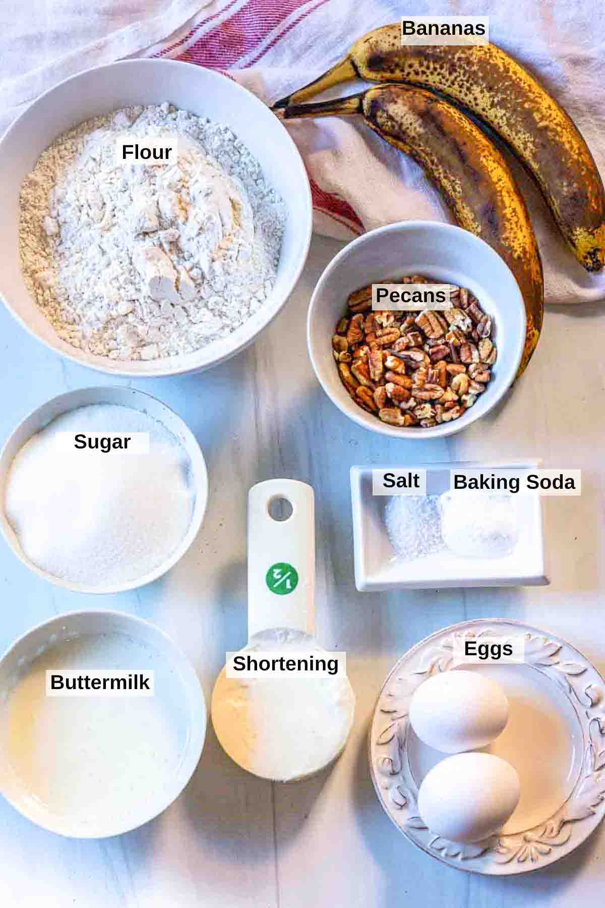 Ingredients to make old fashioned banana nut bread.