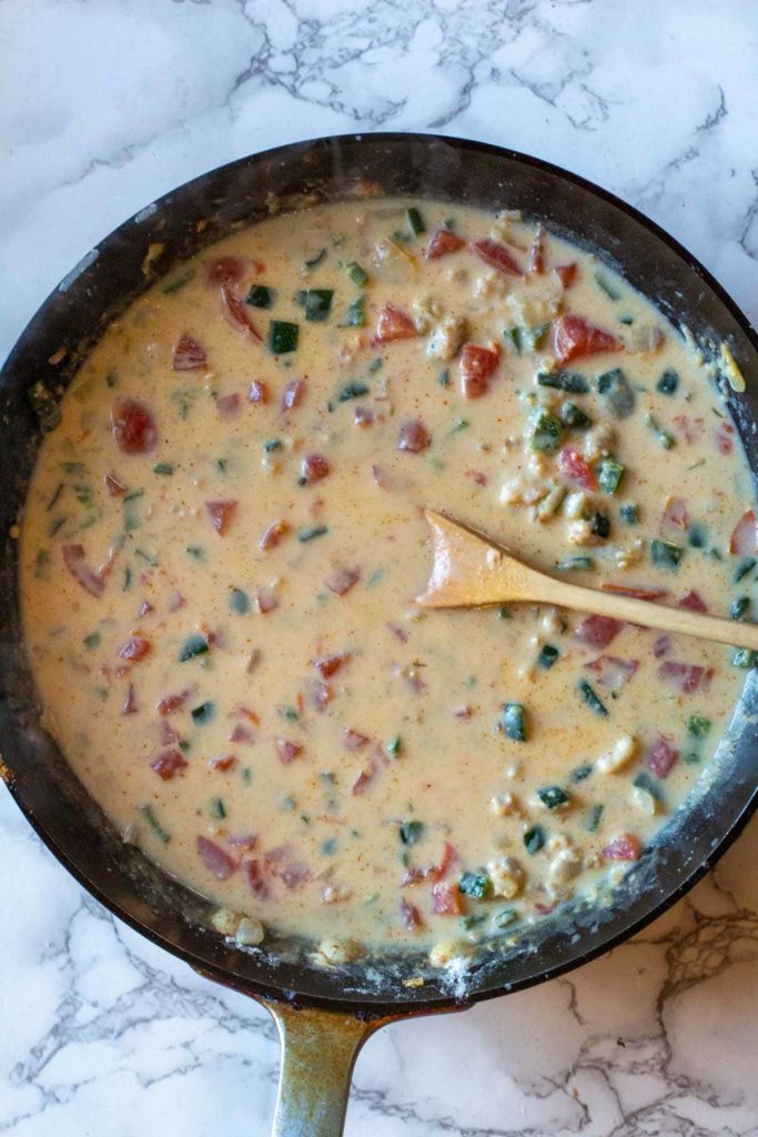 making spicy cheese sauce for chicken soup