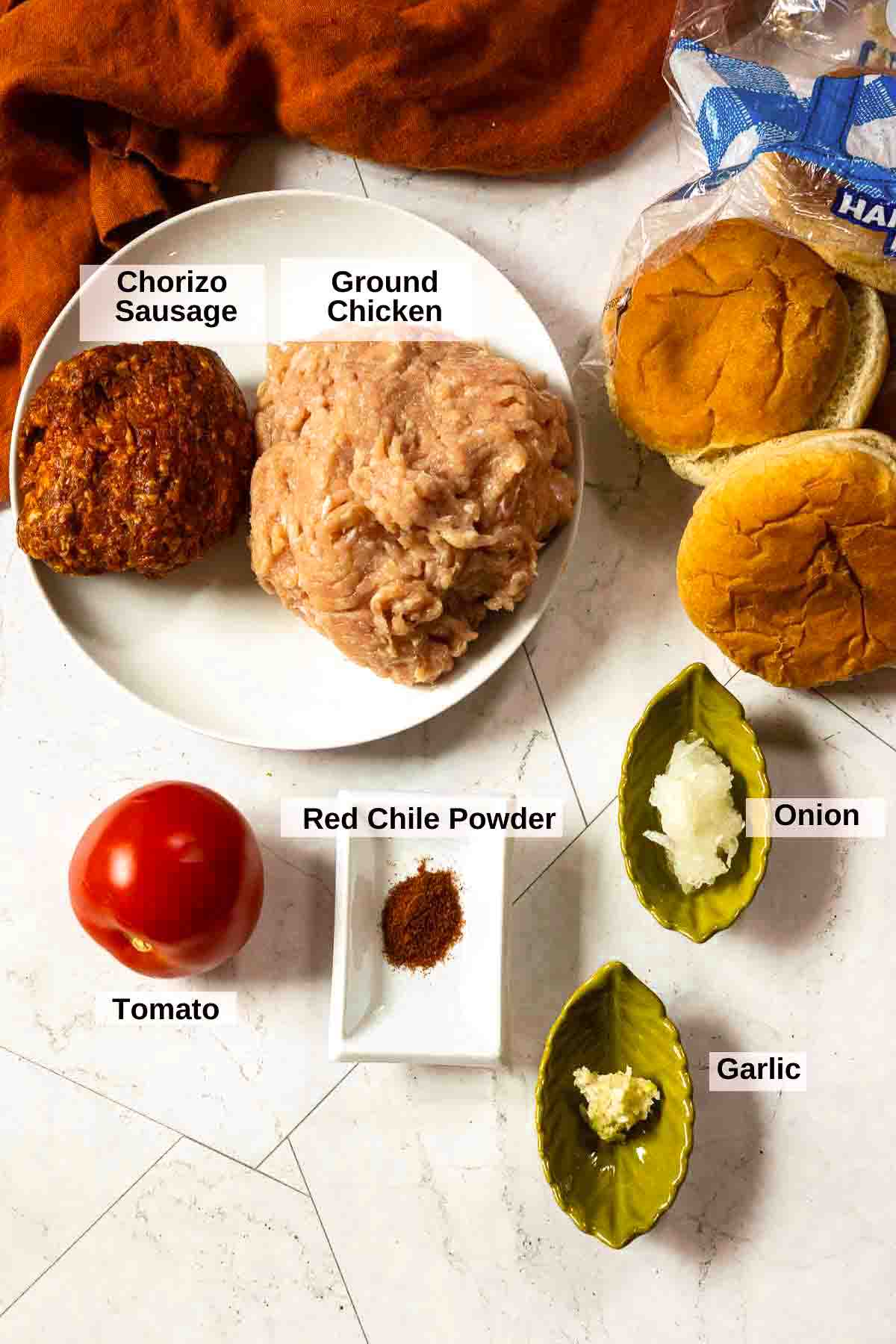 Ingredients to make grilled chicken burgers.