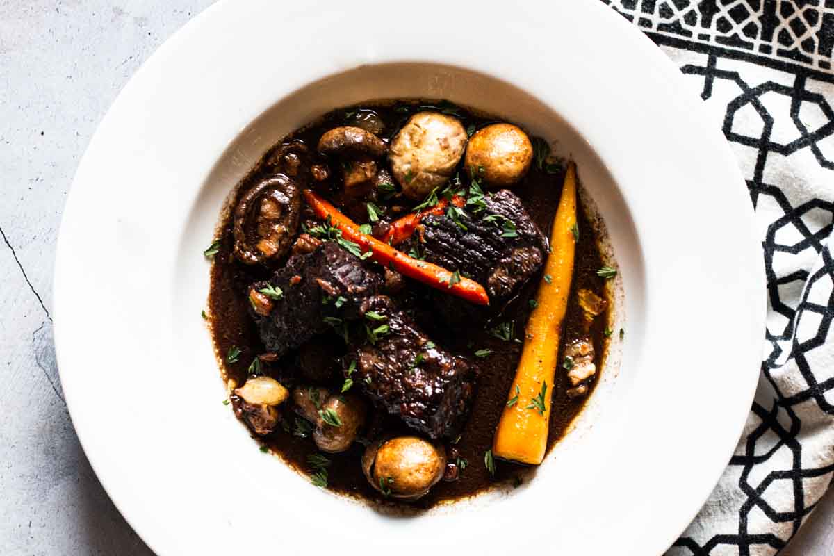 Jacques Pepin Red Wine Beef Stew in a white bowl.