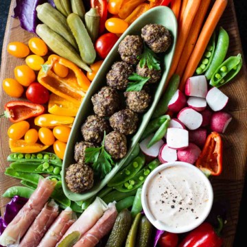 Spicy lamb meatballs on a crudite platter.