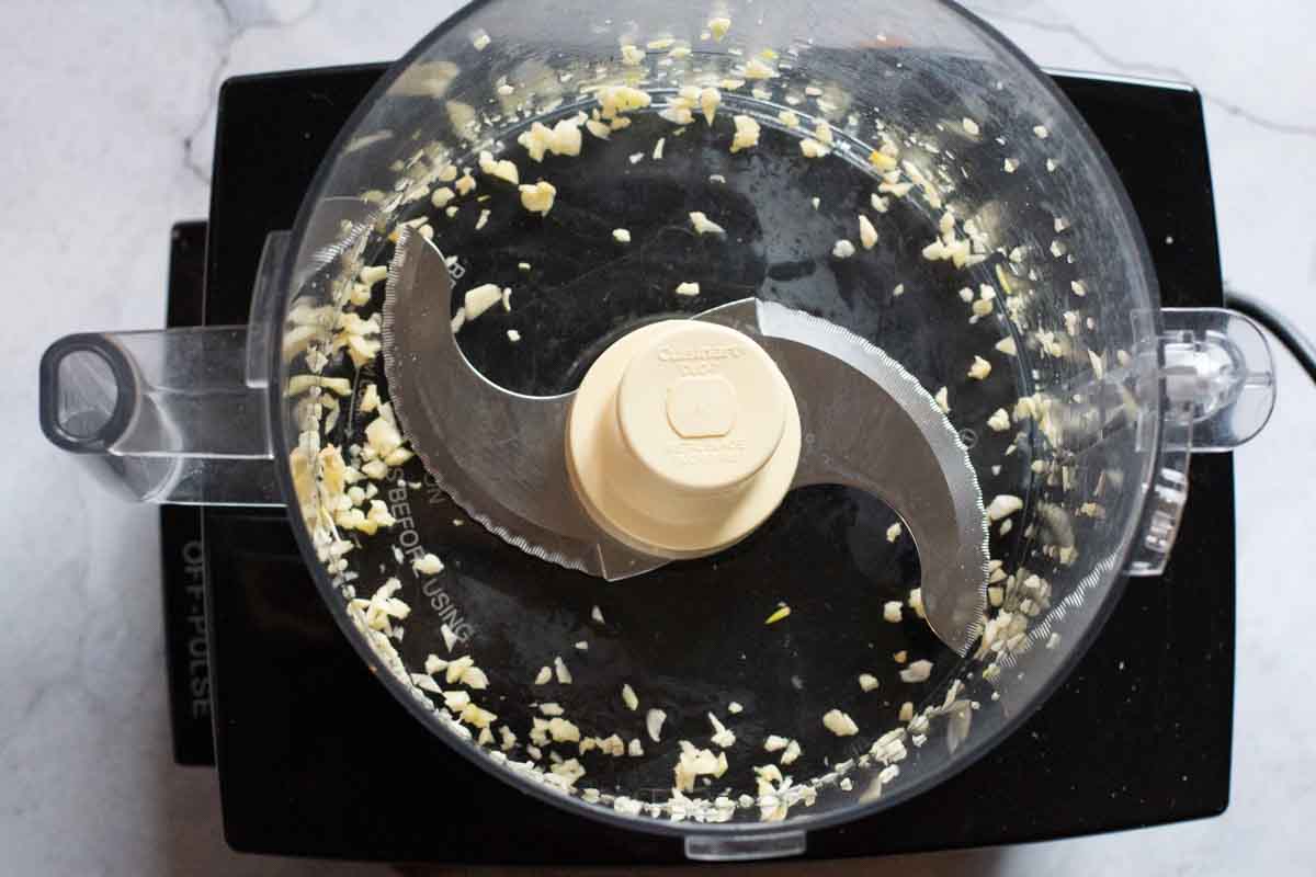 Chopping garlic in a food processor.