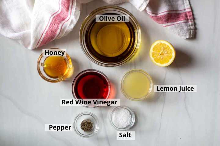 Ingredients to make red wine vinegar dressing.