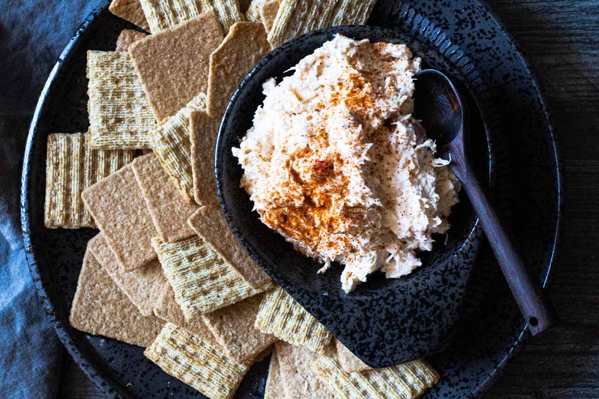 Chicken appetizer spread using canned chicken served with crackers.
