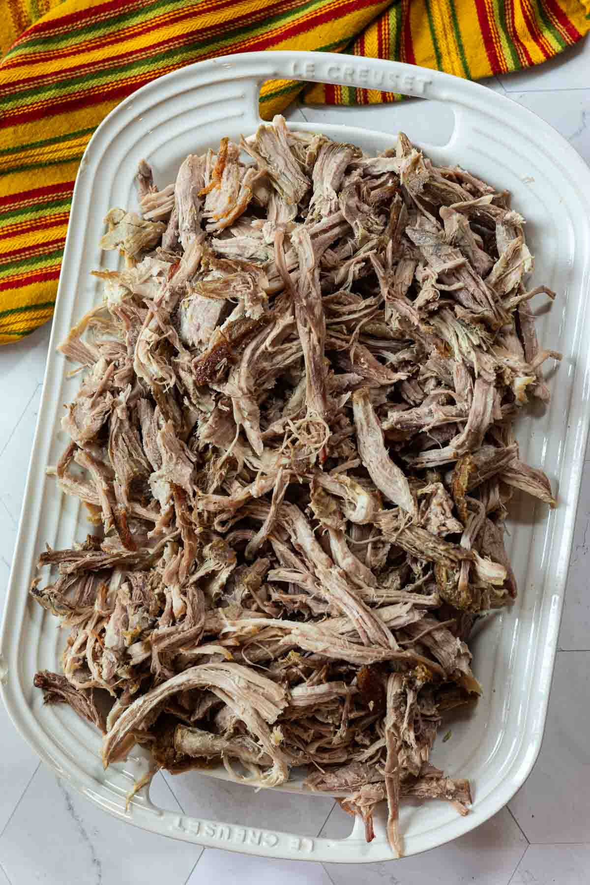 Shredded pork shoulder roast meat to make Hatch Green Chili Colorado.