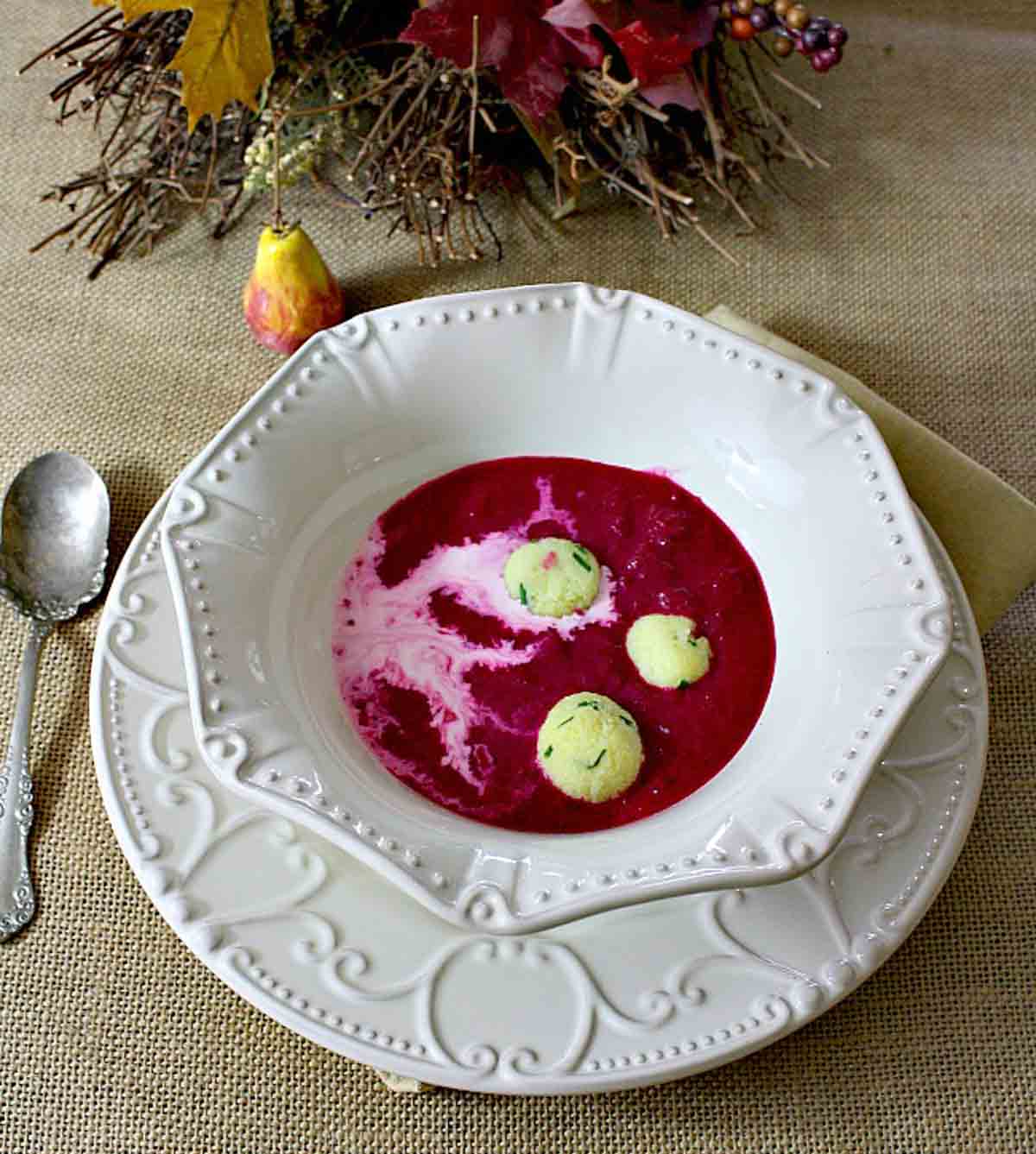 Beet soup with horseradish dumplings and sour cream.
