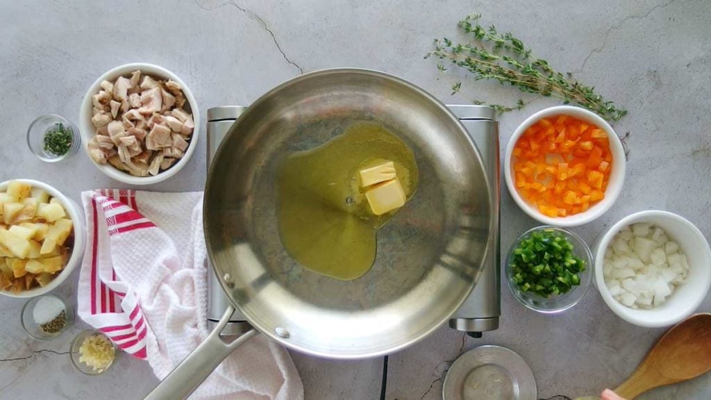 Melting butter to make chicken hash