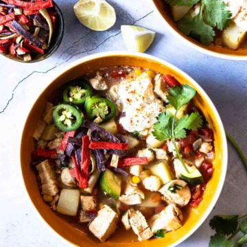 Southwest chicken soup with hominy and potatoes.