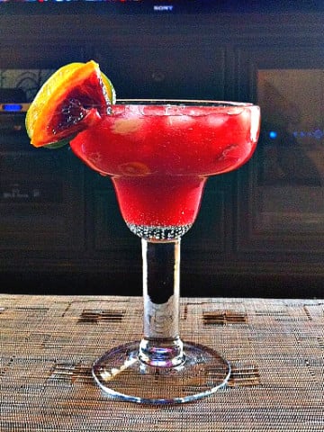 Blood Orange Margarita with Cointreau and garnished with slices of blood orange