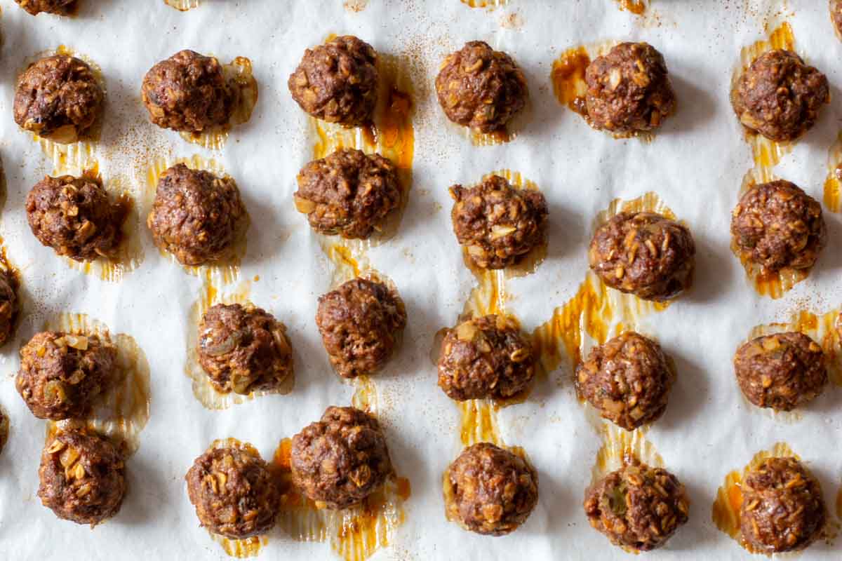 Cooked Mexican Meatballs on a sheet pan.